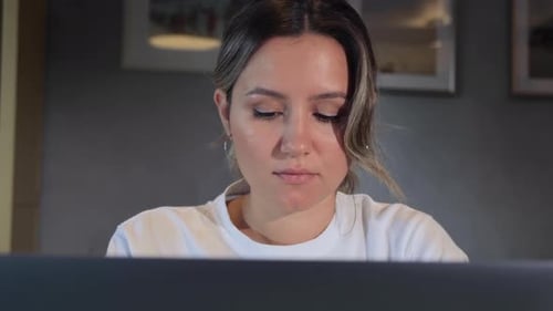 Close up of woman looking at computer