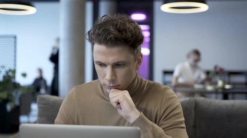 Face Of Focused Specialist Reading The Screen