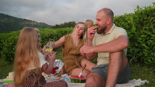 Family Picnic Outdoors on a Sunny Day