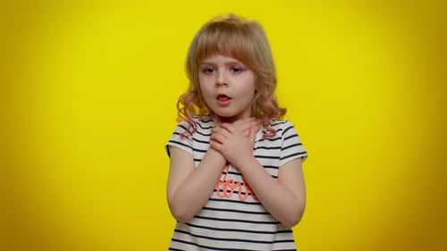 Child with Sore Throat Holding Neck