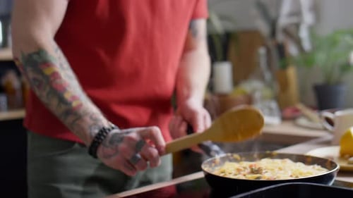 Cooking Spaghetti on Stove Top in Kitchen