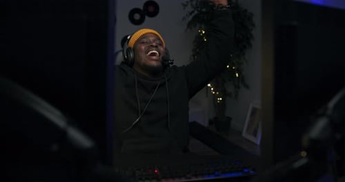 Excited Gamer Wins While Playing Computer Game