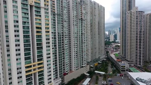 Aerial drone footage of buildings with sea view in Panama City