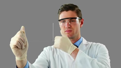 Male doctor using an futuristic digital tablet