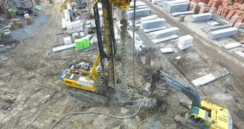 Aerial View of Construction Site with Equipment