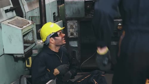 Factory Worker Injured By Accident While Using Machine in Factory