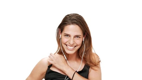 Happy Young Woman Dancing to Music