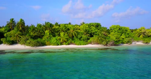 Daytime aerial island view of a white paradise beach and blue sea background in best quality 4K