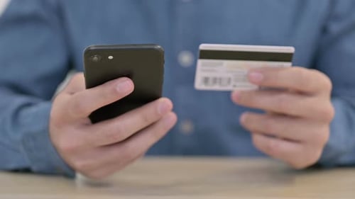 Close Up of Online Payment on Smartphone By Man