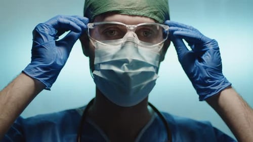 Health Care Worker with Face Mask and Glasses