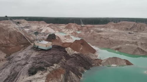 Aerial View of Sand and Gravel Quarry with Cranes