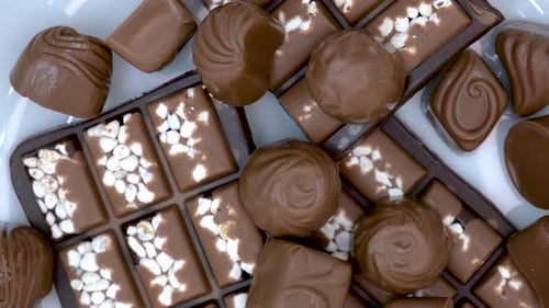 Assortment of Delicious Milk Chocolate Candies Overhead