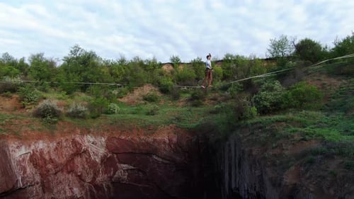 Tightrope Walking Across Green Canyon