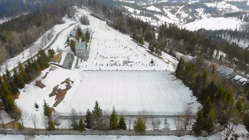 Aerial View Biathlon, Winter Sports in the Mountains. Cross Country Skiing in the Ukrainian