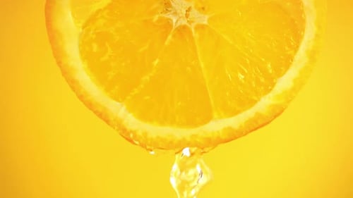 Juicy Orange Slice with Dripping Juice