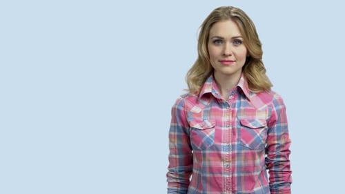 Smiling Woman Presenting Product with Open Hands