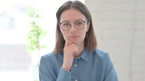 Contemplative Woman Thinking and Pondering Indoors