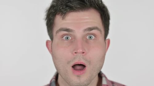 Close Up of Young Man Looking Shocked at Camera
