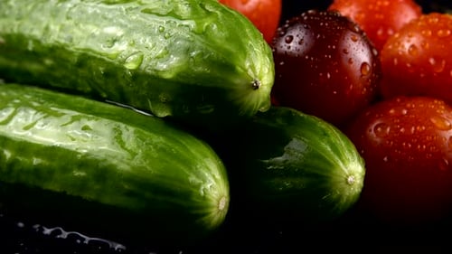 Fresh Cucumbers and Cherry Tomatoes Close Up