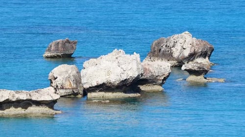 Landscape Footage of Sea Blue Water and Rocks Sunny Daytime Seascape Devastating and Spectacular