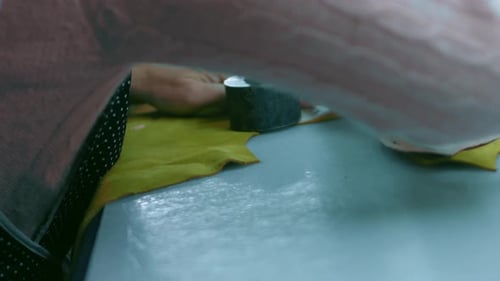 Sewing Machine in a Leather Workshop in Action with Hands Working on a Leather Details for Shoes