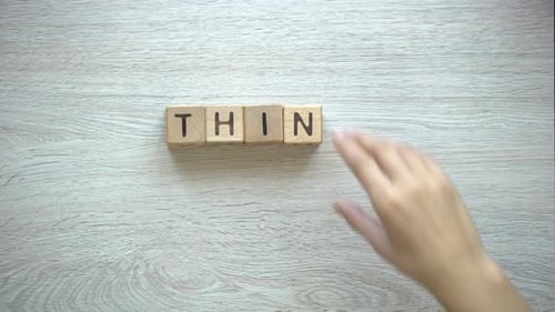 Blocks Spelling the Words 'Think Positive'