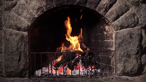 Burning Fire In The Fireplace