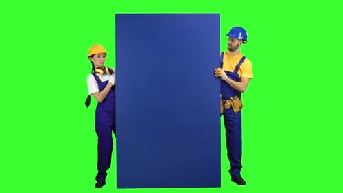 Builders of a Guy with a Girl Show Their Fingers Down. Green Screen