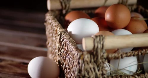 The Basket of Raw Eggs Slowly Rotates on the Table.