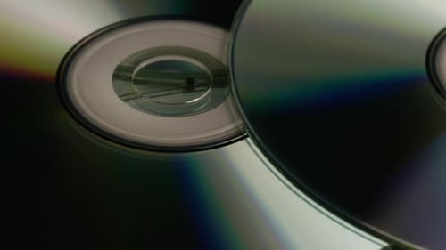 Prise de vue rotative de disques compacts
