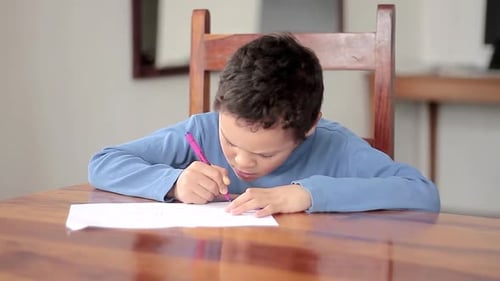 boy with school work at home not going back to school due to coronavirus stock video