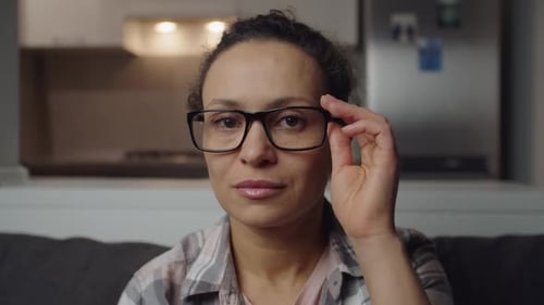 Close up of a Woman Wearing Glasses Indoors