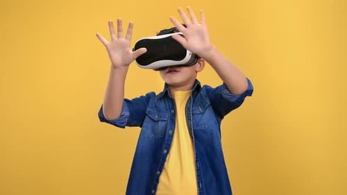 Boy Experiencing Virtual Reality Headset Technology