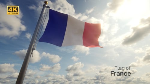 French Flag Waving in Wind Against Sunny Sky
