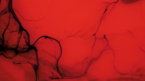 Vibrant Red Abstract Ink Texture Background