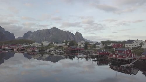 Picturesque view of town by high rocks