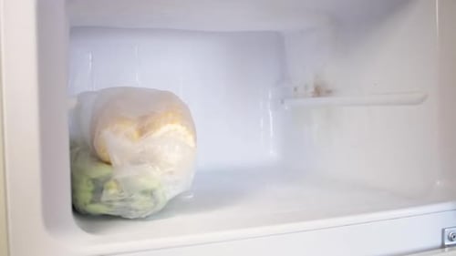 Freezer with Packaged Food and Containers