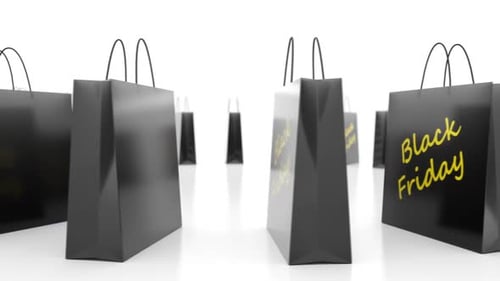 Animated Black Friday Shopping Bags with Gold Text