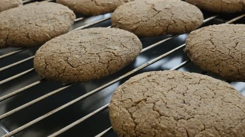 Cracked homemade cookie surface slow tilt 4K 2160p 30fps UltraHD footage - Tilting on buckwheat bre