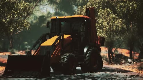 Tractor excavador en Bush Forest