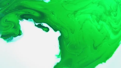 Vibrant Green Liquid Swirling Abstractly on White Background
