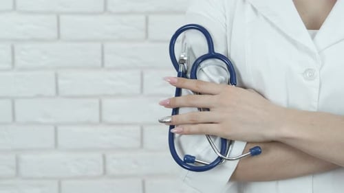 Confident Medical Professional Holding a Stethoscope