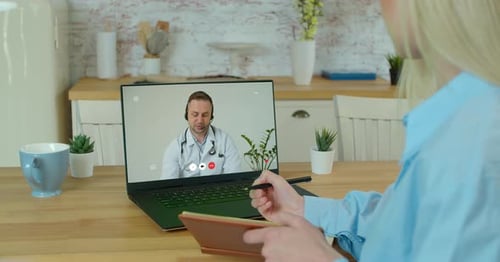 Woman Using Telehealth for Medical Consultation at Home