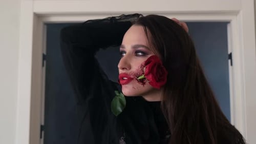 Woman with Rose Makeup Posing Indoors