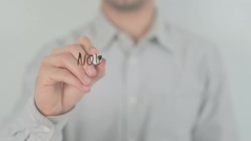 Writing 'Now is Your Time' on Clear Surface