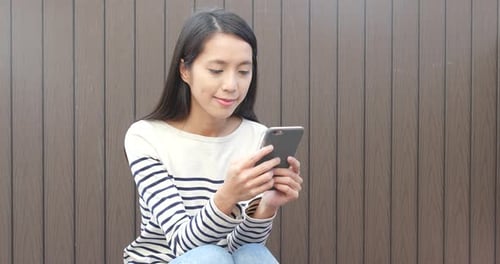 Woman using cellphone
