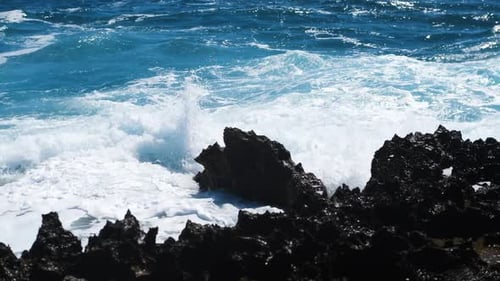 Waves Breaking Over Dangerous Rocks Sea Storm Concept Ocean Waves Crash on the Rocks Creating an