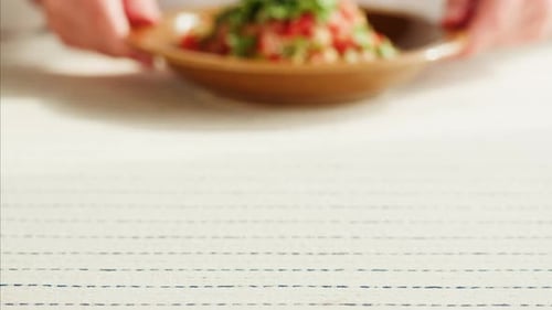 Fresh Tomato Cucumber Salad Placed on Table