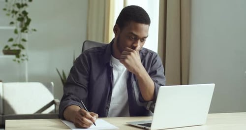 Portrait Smart Focused Student Black Business Man Afro American Guy Sitting at Table in Home Office