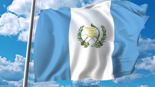 Guatemala Flag Waving Against Blue Sky
